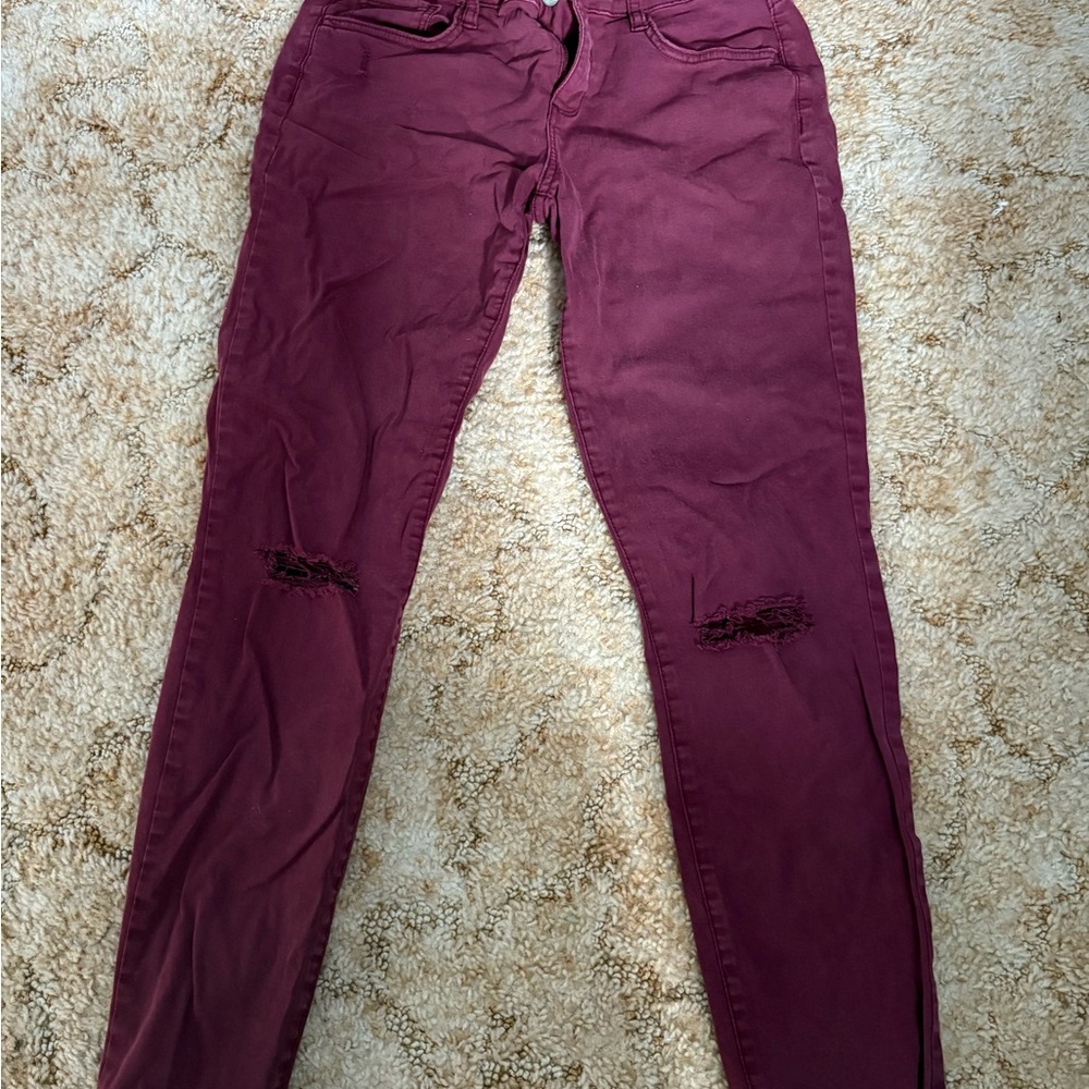 Burgundy Distressed Skinny Jeans